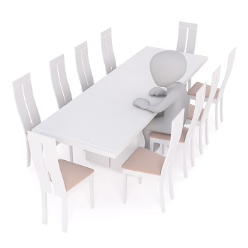 person sitting at empty table -> is God sitting this one out?
