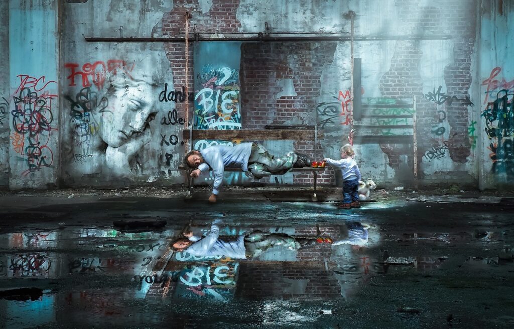 Are we the good Samaritan? Or the robber? - illustrated by a homeless person sleeping on a bench in an alley full of graffiti while a young boy plays with his toys on the same bench.