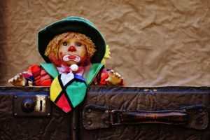 leaving-clown-in-suitcase-1200-800 » God versus religion How can I leave you again?