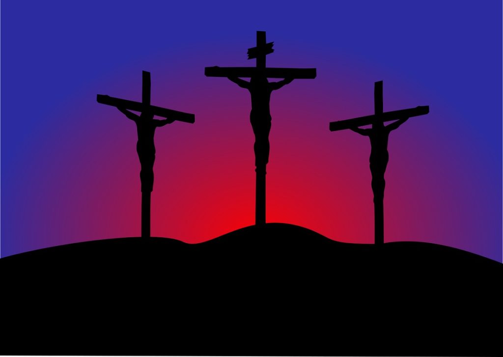 Who were the other two men on the crosses?