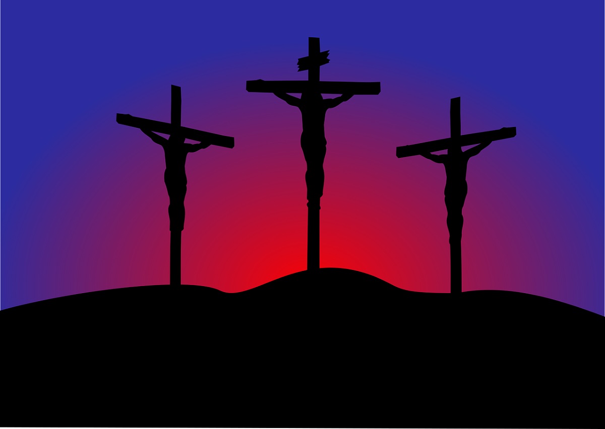 Who were the other two men on the crosses?